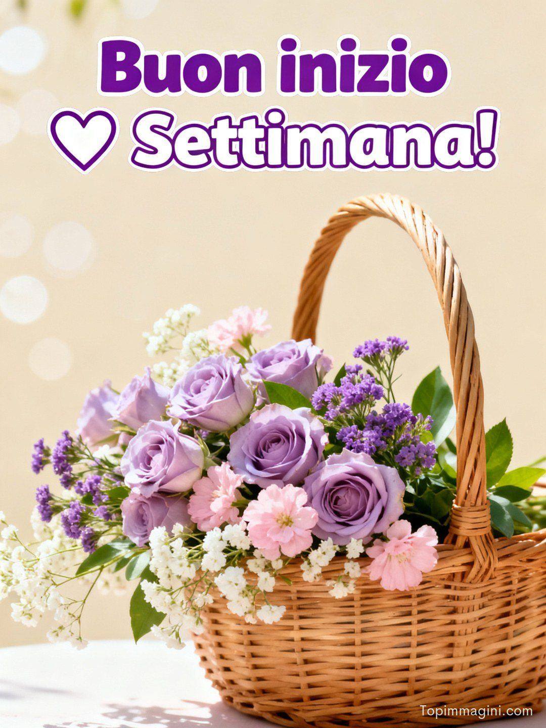 Cestino di vimini con rose lilla e fiori rosa e bianchi su sfondo chiaro, con augurio di buon inizio settimana