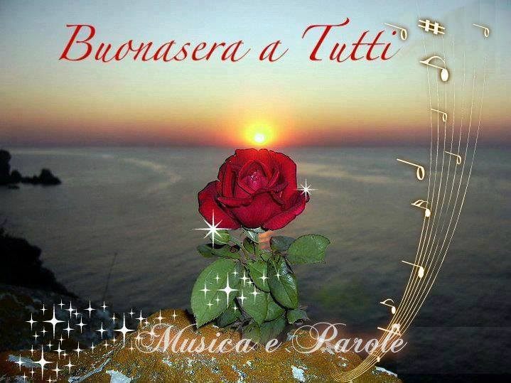 Una rosa rossa, un tramonto e note musicali con la scritta Buonasera a Tutti Musica e Parole