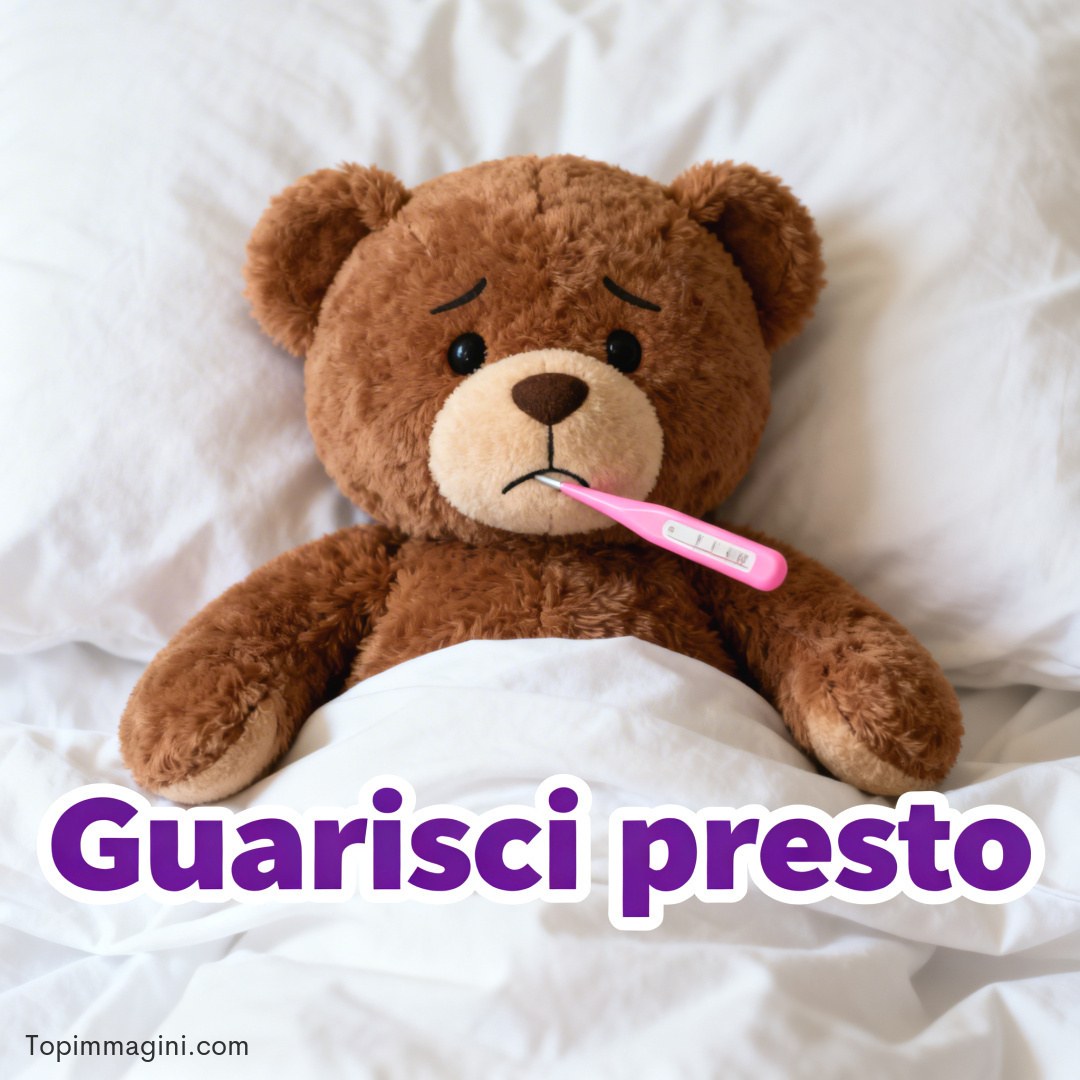 Orsetto di peluche a letto con termometro in bocca e scritta augurale