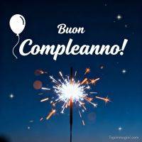 Scritta di auguri con palloncino e stellina scintillante su sfondo blu notturno